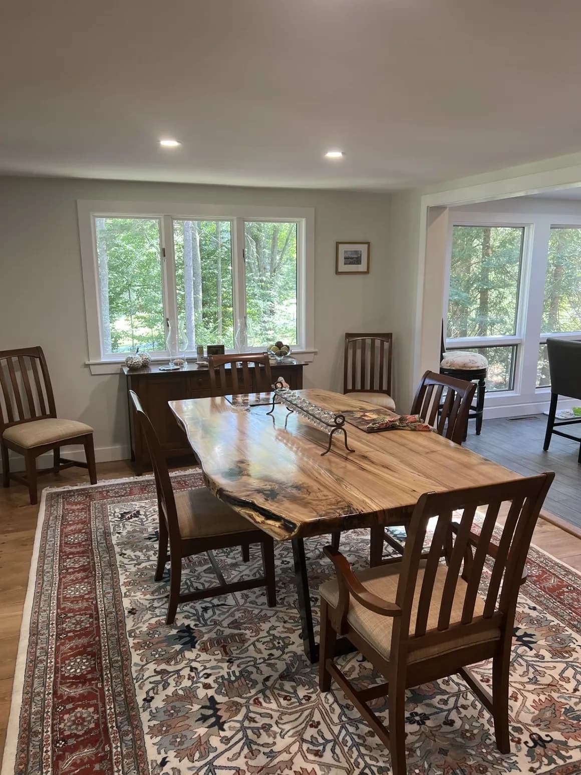 Live edge dining table with steel base